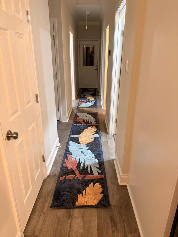 Customer photo for review titled "Great rug with vibrant colors"