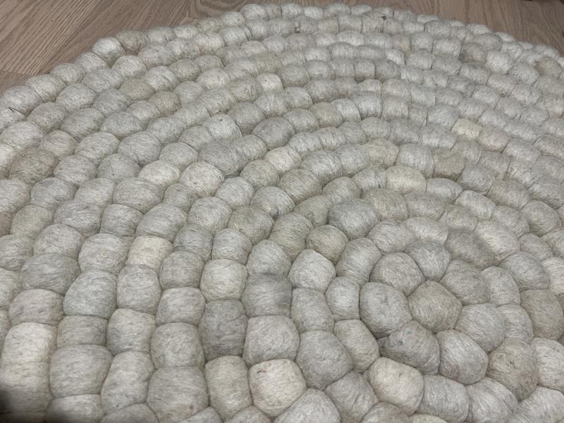 Customer photo for review titled "Fabulous Felt Ball Round Rug"