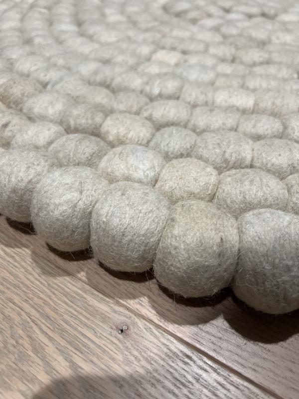 Customer photo for review titled "Fabulous Felt Ball Round Rug"