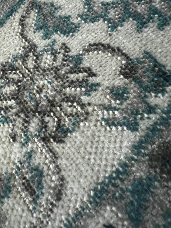 Customer photo for review titled "Very thin impossible to get to lay flat"