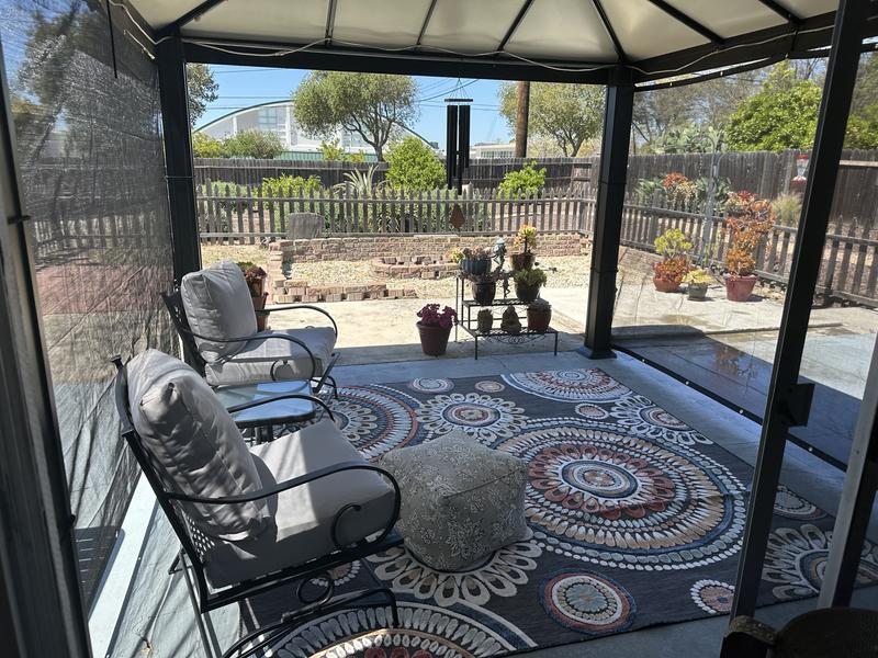 Customer photo for review titled "Gorgeous outdoor rug for my gazebo!"