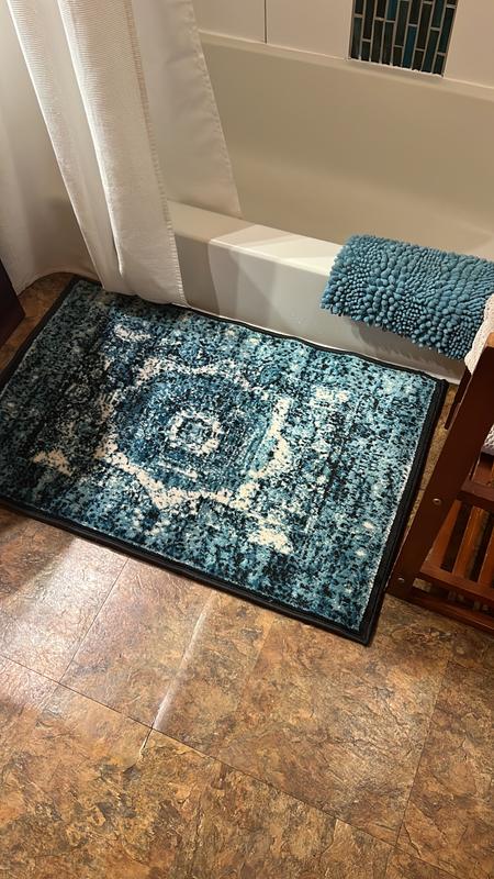 Customer photo for review titled "Brilliant blue Ankara rug"
