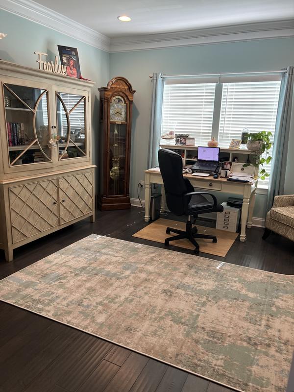 Customer photo for review titled "Happy with this replacement rug for my office"