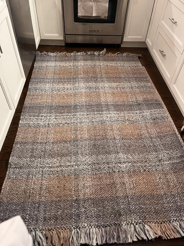 Customer photo for review titled "Plaid rug"