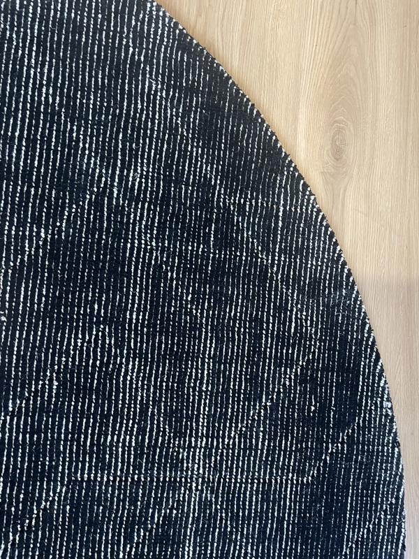 Customer photo for review titled "Nice looking rug at a great price."