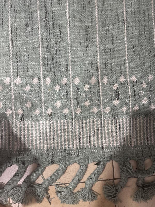Customer photo for review titled "I ordered two rugs for my kitchen thinking I’d get"