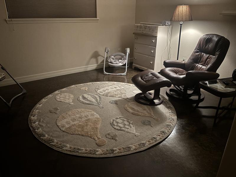 Customer photo for review titled "Whimsy round rug so adorable"