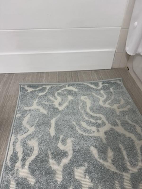 Customer photo for review titled "Coral style rug"