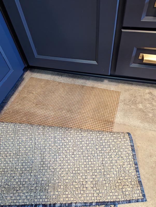 Customer photo for review titled "Keeps my kitchen rug from slipping"