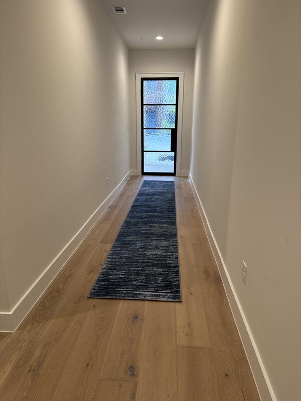 Customer photo for review titled "We are very happy with Asha 2x16 blue runner rug."