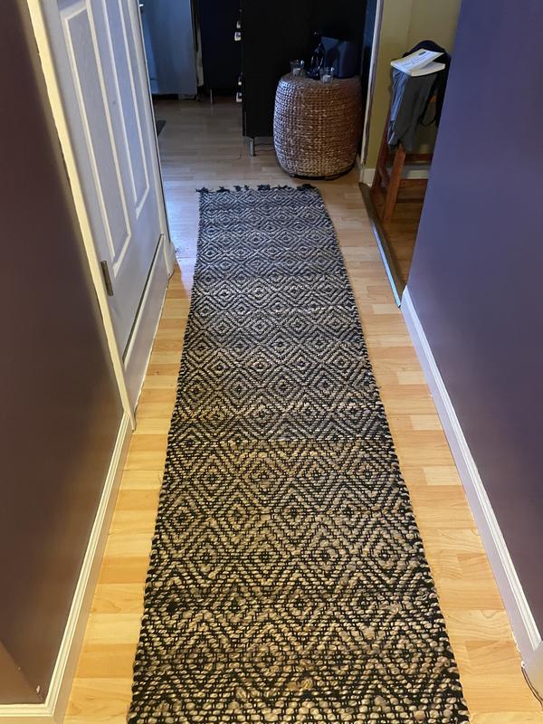 Customer photo for review titled "Nice looking jute rug with a caveat."