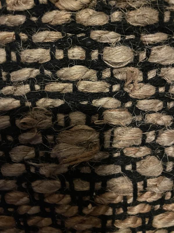 Customer photo for review titled "Nice looking jute rug with a caveat."