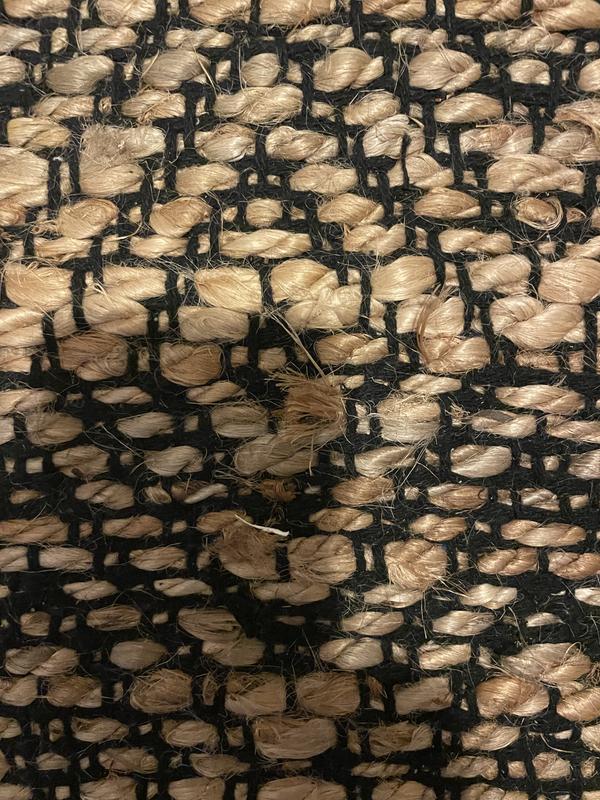 Customer photo for review titled "Nice looking jute rug with a caveat."