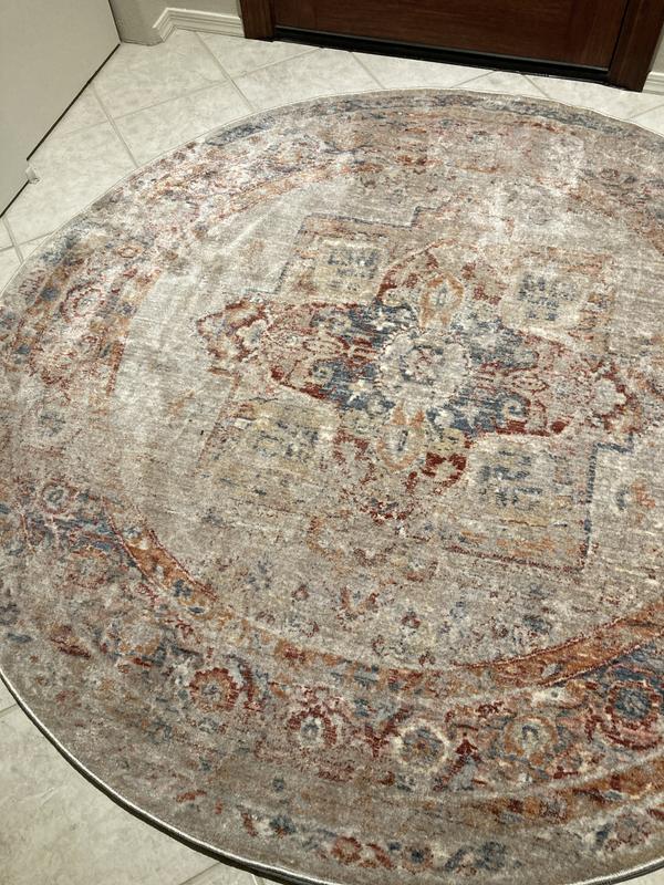 Customer photo for review titled "A beautiful and durable rug for my entryway."