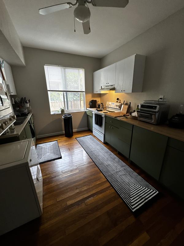 Customer photo for review titled "Great modern rug for Kitchen"