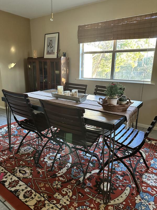 Customer photo for review titled "Perfect dining room rug."
