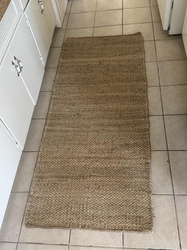 Customer photo for review titled "Lovely rug with slight flaw"