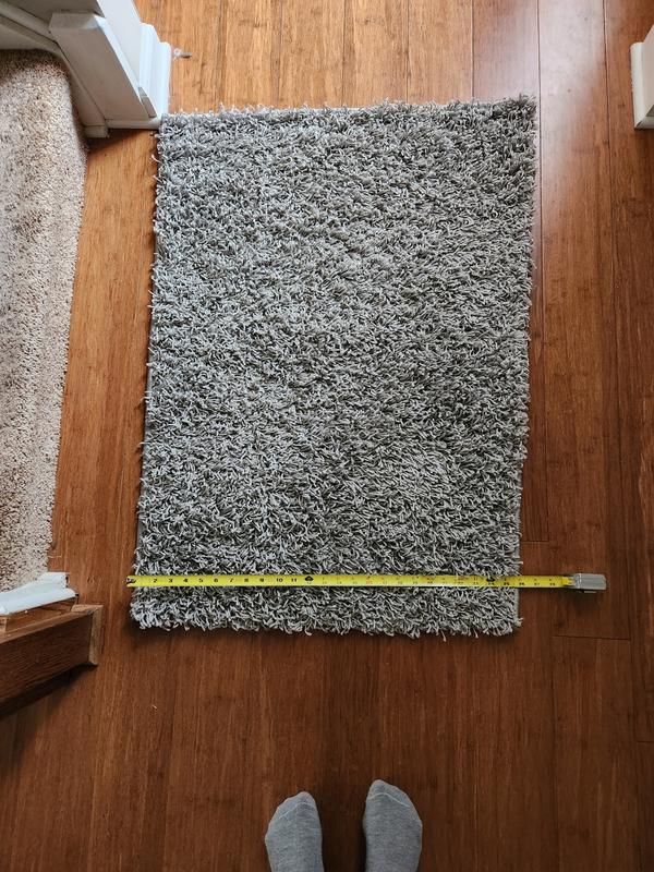 Customer photo for review titled "Defective Rug"