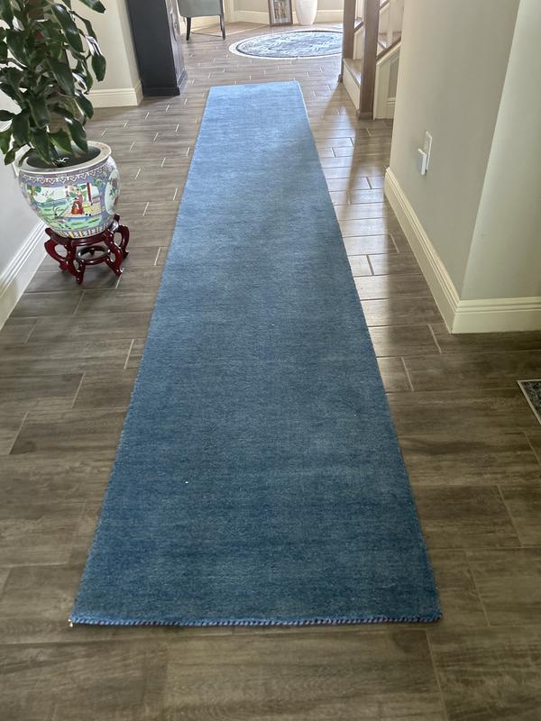 Customer photo for review titled "Vivid blue carpet runner"