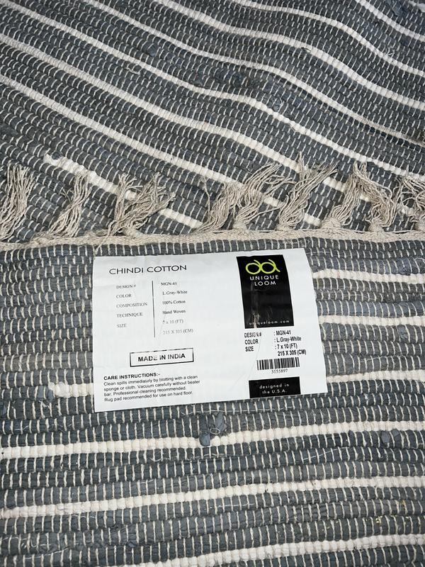 Customer photo for review titled "Rug is not light grey"