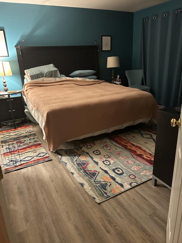 Customer photo for review titled "Nice rug looks great in my room"
