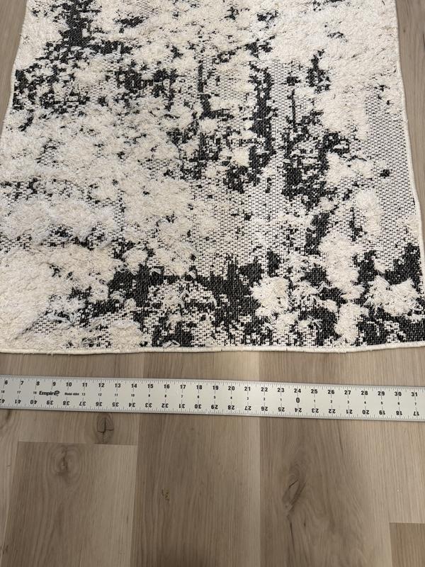 Customer photo for review titled "Poorly cut corners not square."