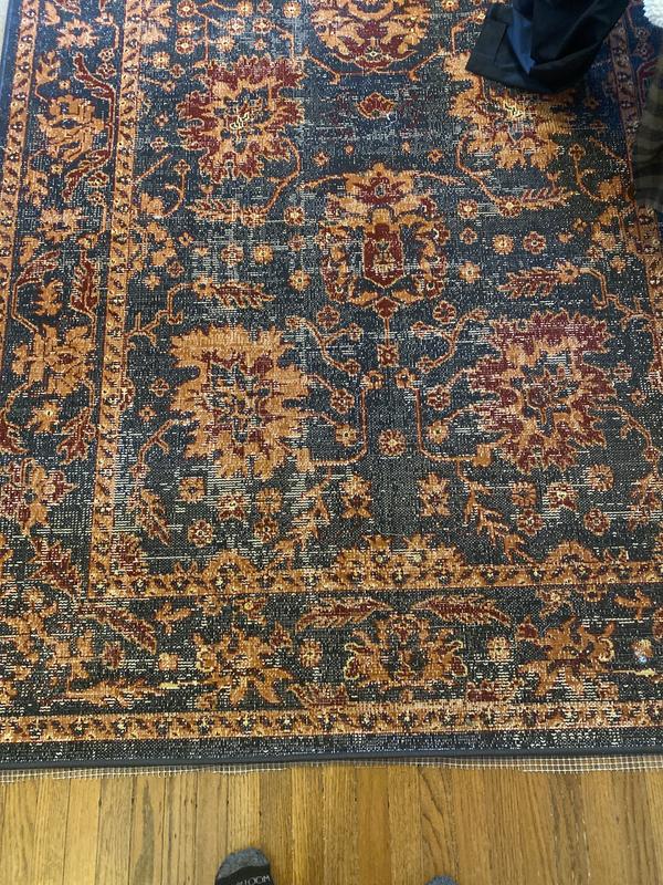 Customer photo for review titled "The rug really tied the room together dude."