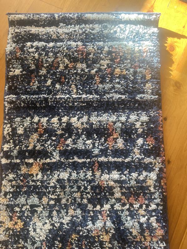 Customer photo for review titled "Moroccan rug navy"