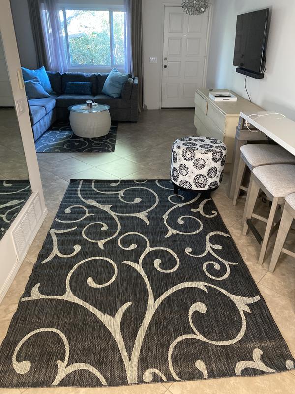 Customer photo for review titled "Cool looking indoor/outdoor rug i love it ❤️!"