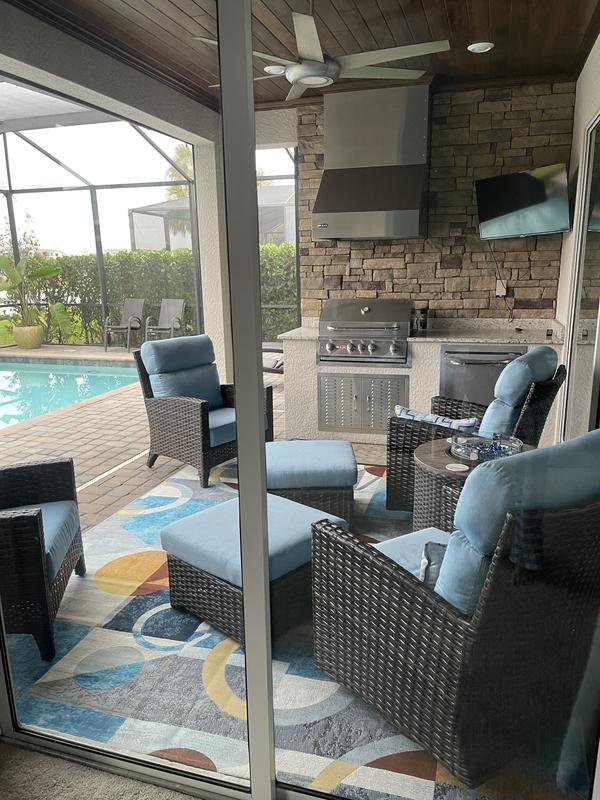 Customer photo for review titled "Outdoor rug but nice enough to use indoor! Love it"