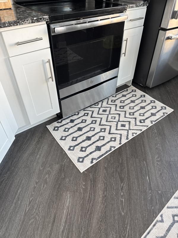 Customer photo for review titled "Pretty kitchen rug!"