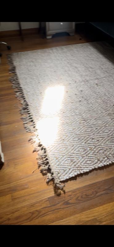 Customer photo for review titled "Love the rug stinky."