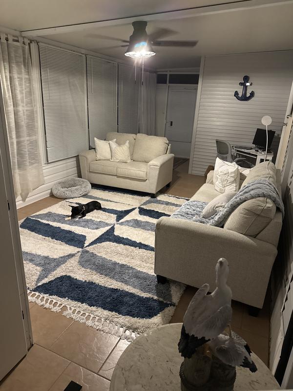 Customer photo for review titled "Beachy Rug that laid flat the first day."