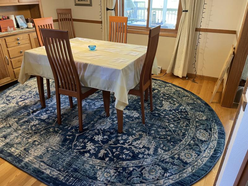Customer photo for review titled "Nice oval rug with character"