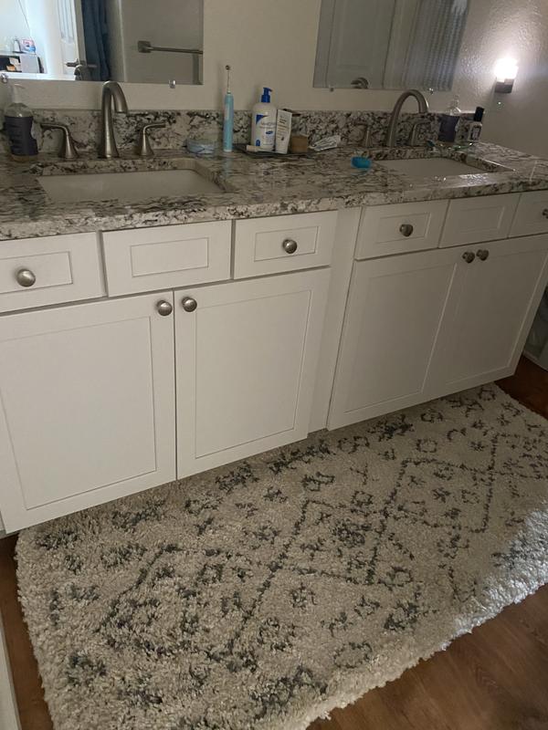 Customer photo for review titled "This rug is so soft and comfortable to stand on!"