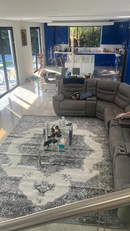 Customer photo for review titled "Great looking rug for living room"