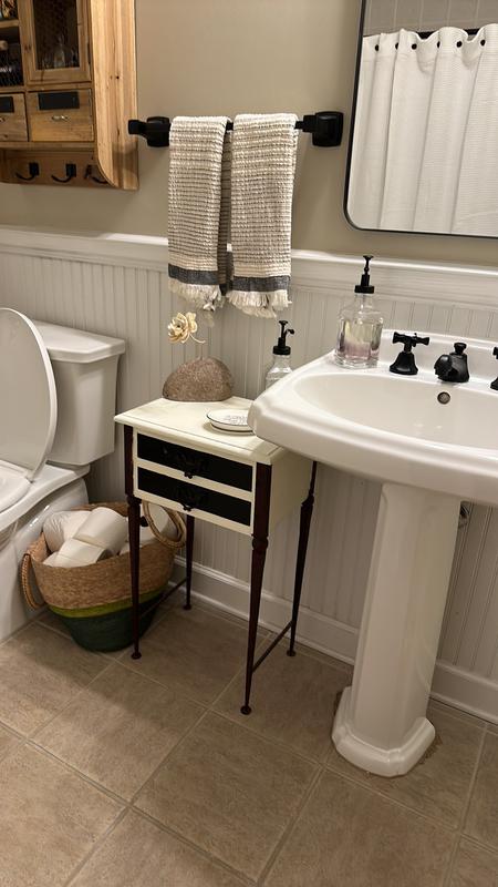 Customer photo for review titled "Beautiful accent for a black and white bathroom"