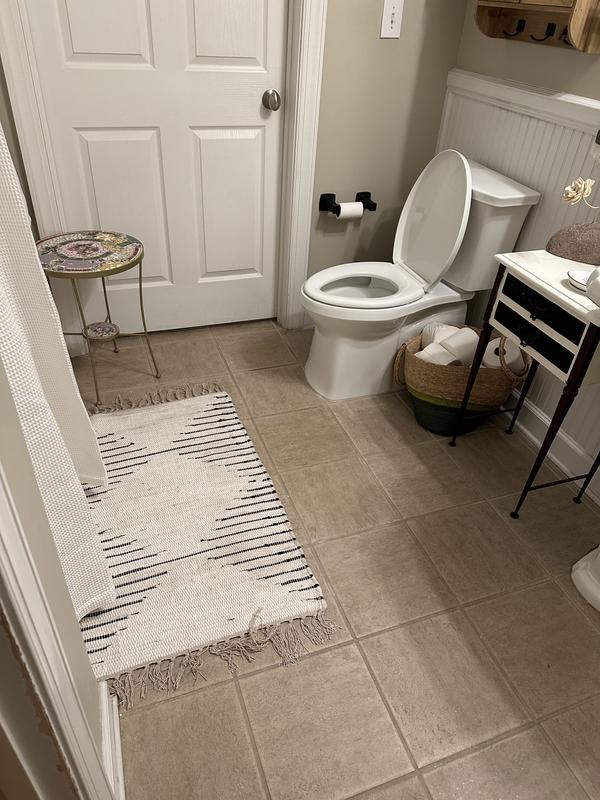 Customer photo for review titled "Beautiful accent for a black and white bathroom"