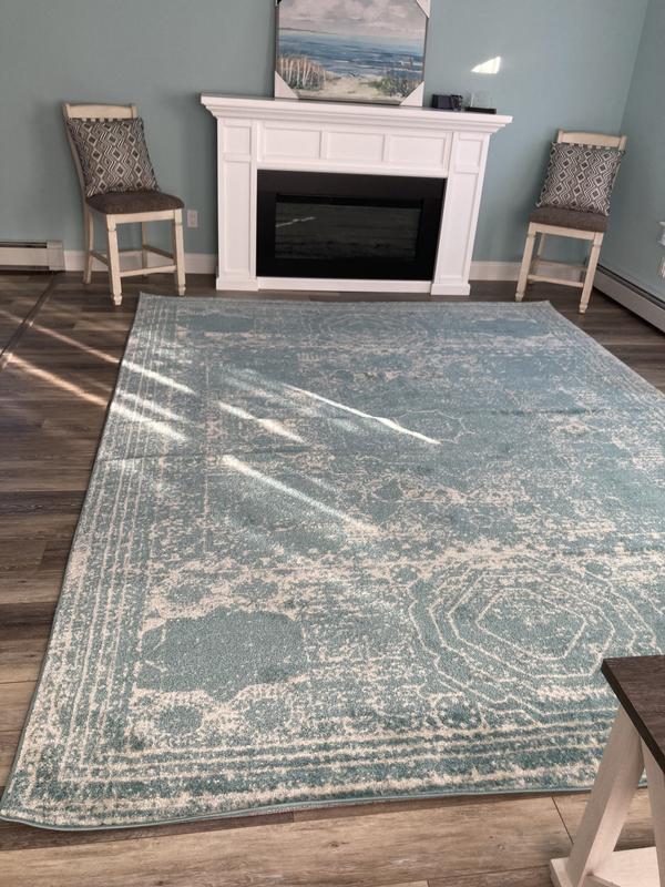 Customer photo for review titled "Bright & cozy rug"