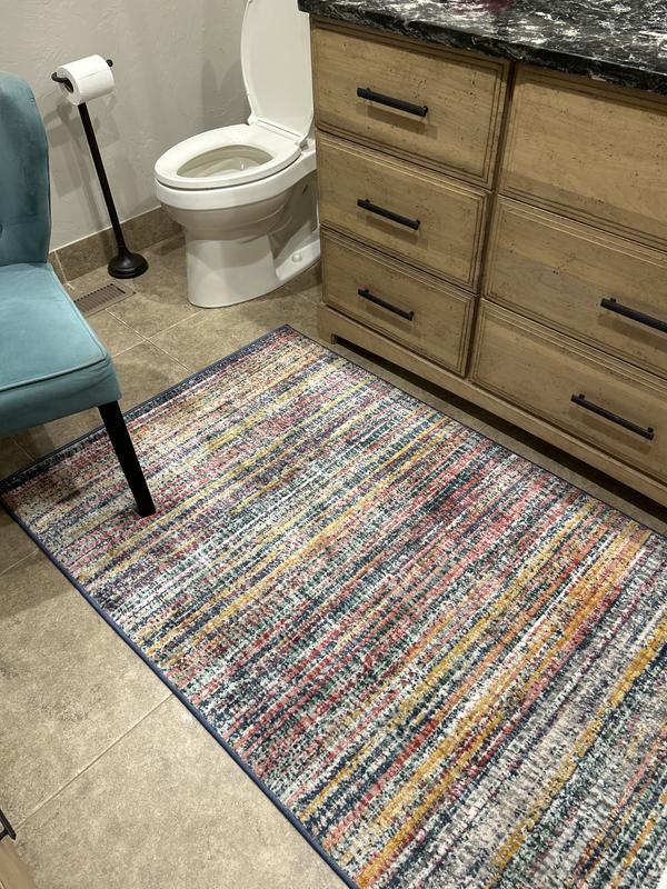 Customer photo for review titled "Cheap looking rug"