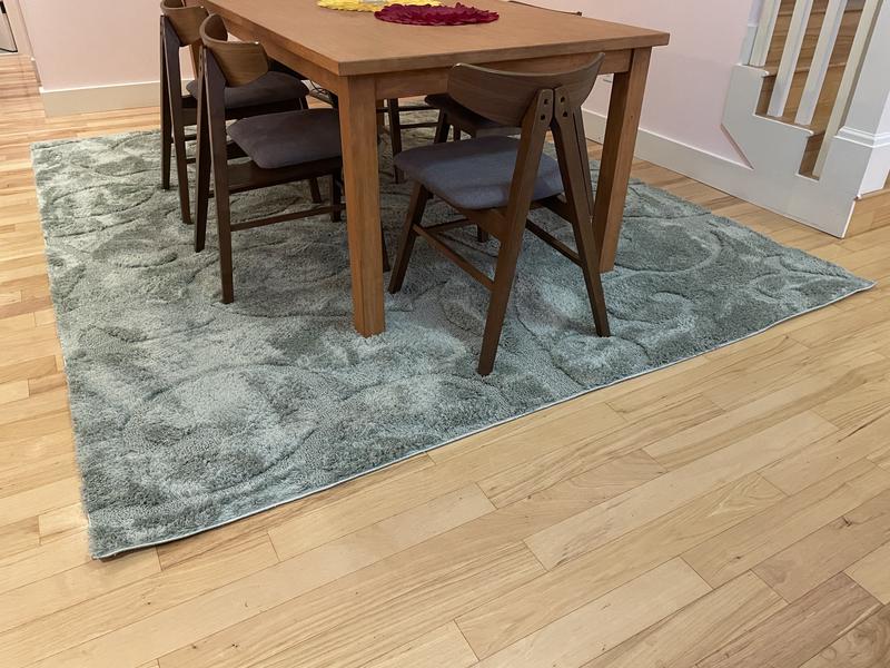 Customer photo for review titled "Soft rug - sage green color misleading online"