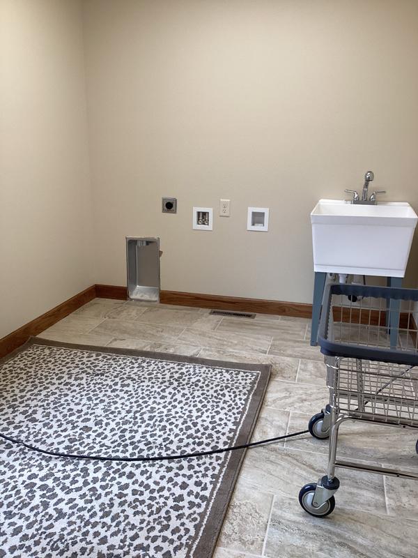 Customer photo for review titled "Fun Rug to make laundry room a little cheerier"