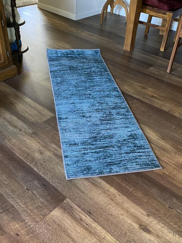 Customer photo for review titled "Pretty teal runner rugs"