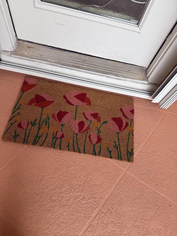 Customer photo for review titled "Beautiful and cute doormat"