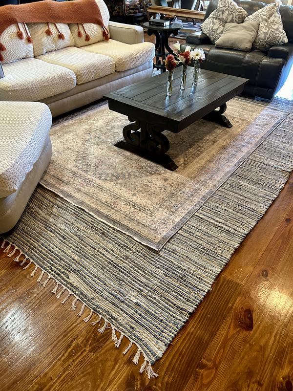 Customer photo for review titled "Layering rugs"