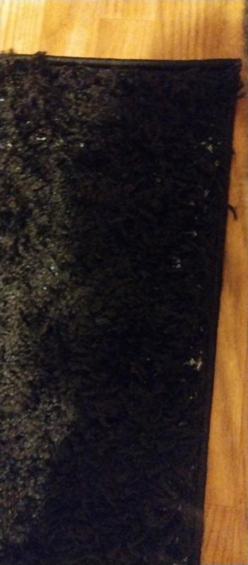 Customer photo for review titled "Nice rug wish it was whole."