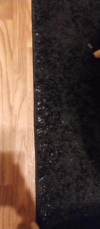 Customer photo for review titled "Nice rug wish it was whole."