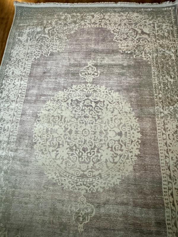 Customer photo for review titled "Good quality rug but photos are a bit misleading"