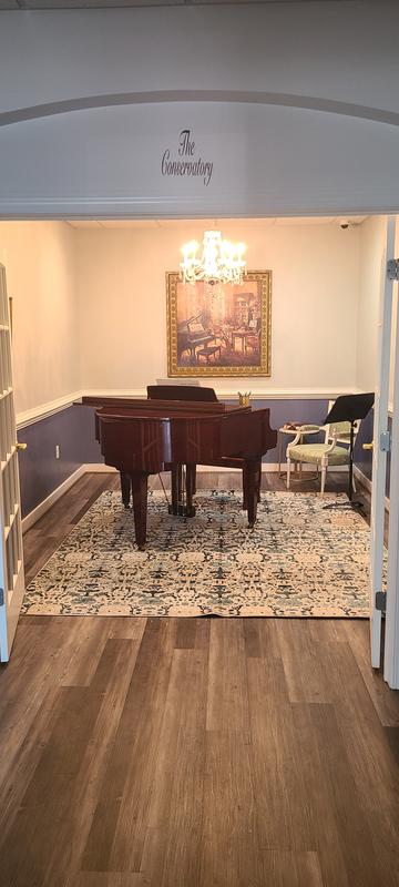 Customer photo for review titled "Awesome rug awesome price!"