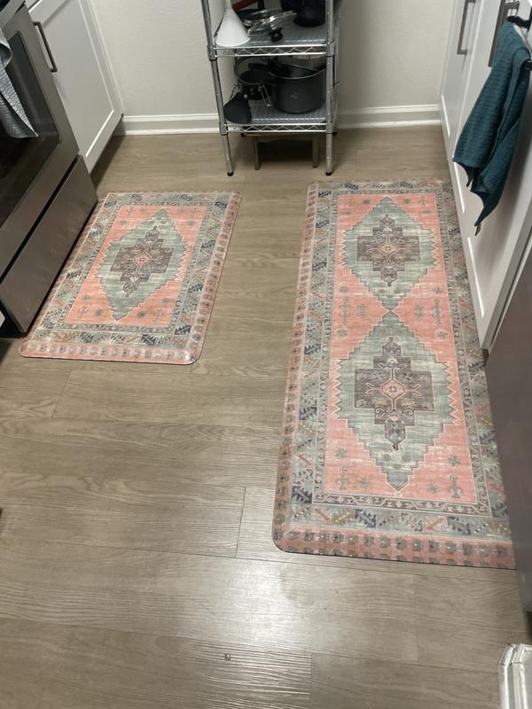 Customer photo for review titled "Nice and cushy upgrade to my kitchen rugs!"